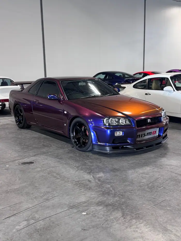 Nissan Skyline GT-R R34 in a color-shift purple finish