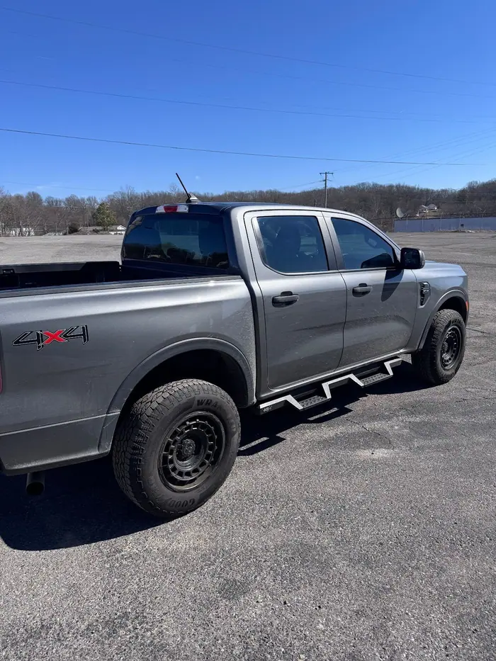 Gray Ford Ranger pickup with tinted rear windows